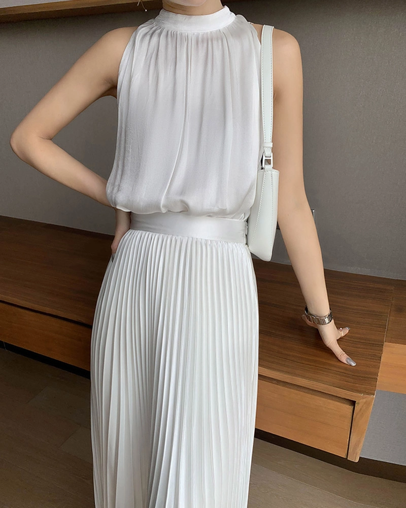 Professional wholesale clothing manufacturer displaying hand-pleated blouse details