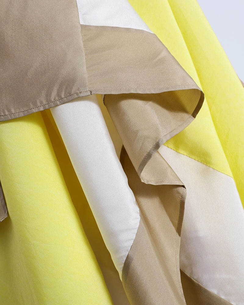 Unleash your inner fashionista with our Silk Color-Block Patchwork Dress, where contemporary design meets luxurious silk.