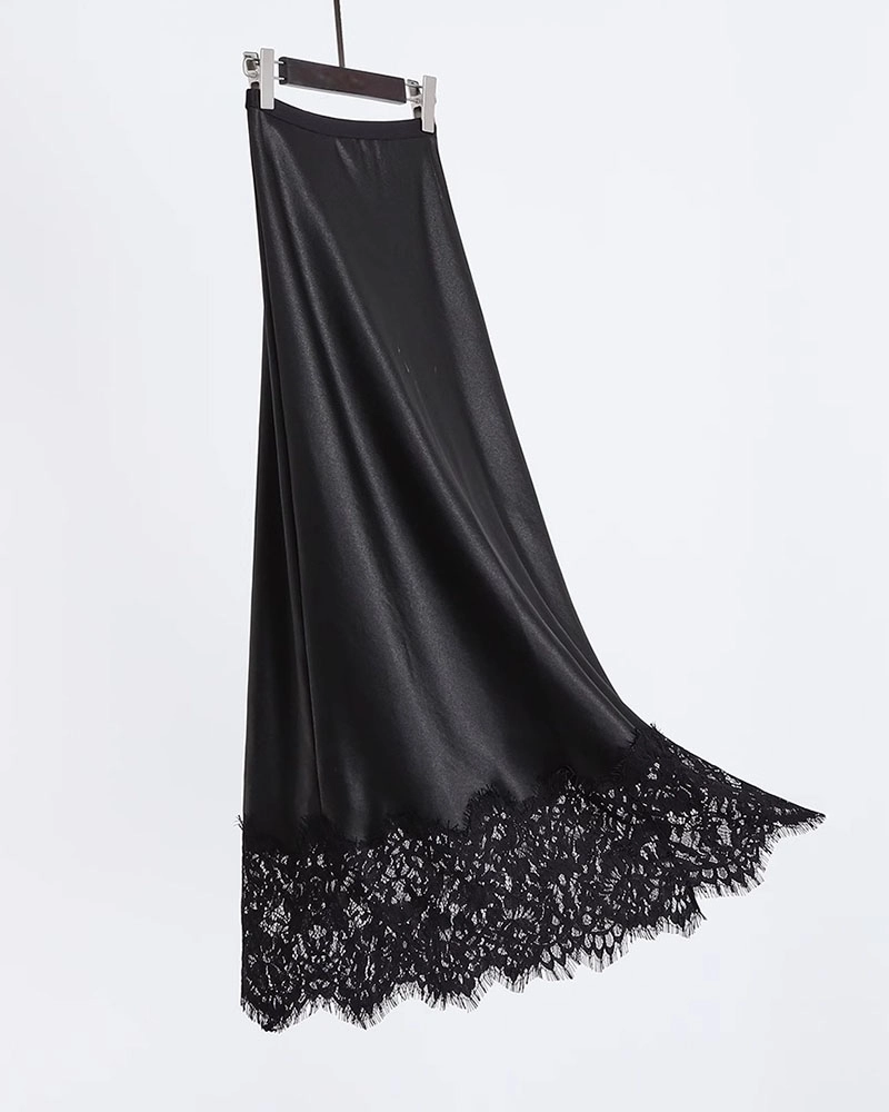 Hand-finished silk lace skirt with intricate detailing, produced by an ethical custom clothing manufacturer.