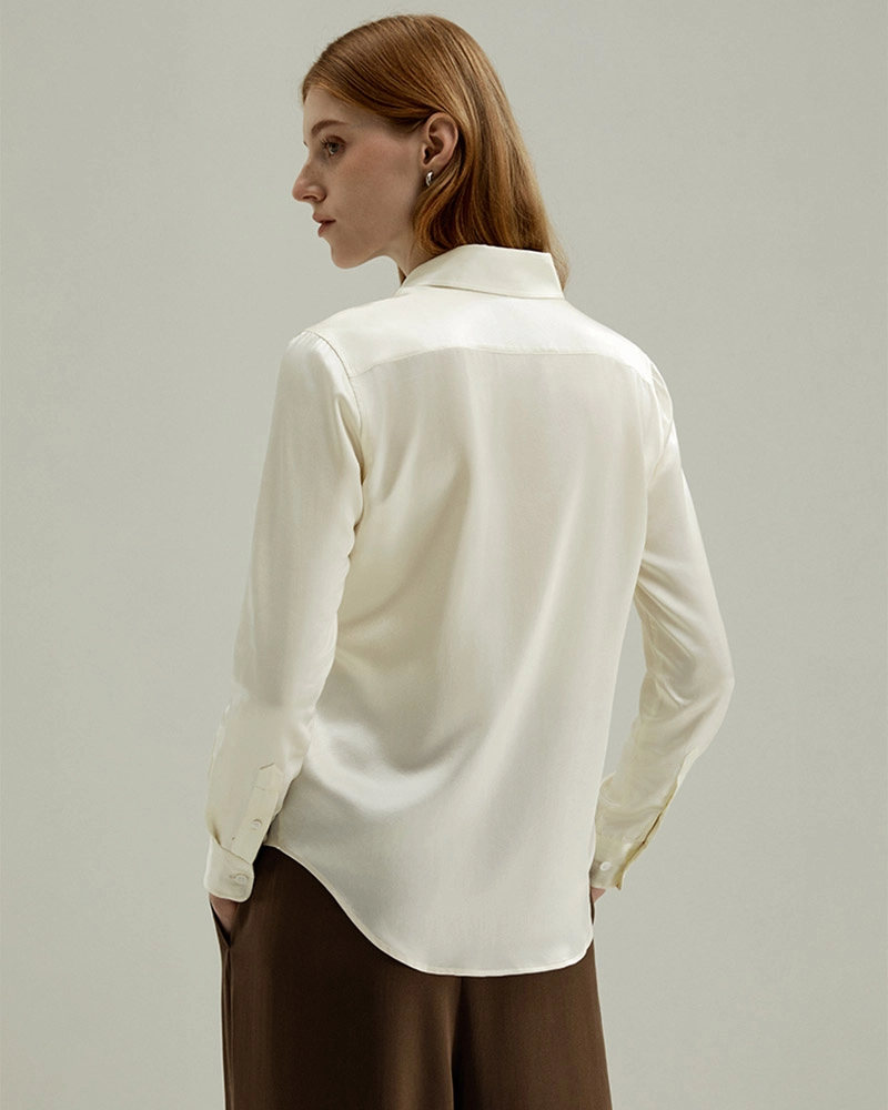 Casual styling of women’s silk blouse with jeans
