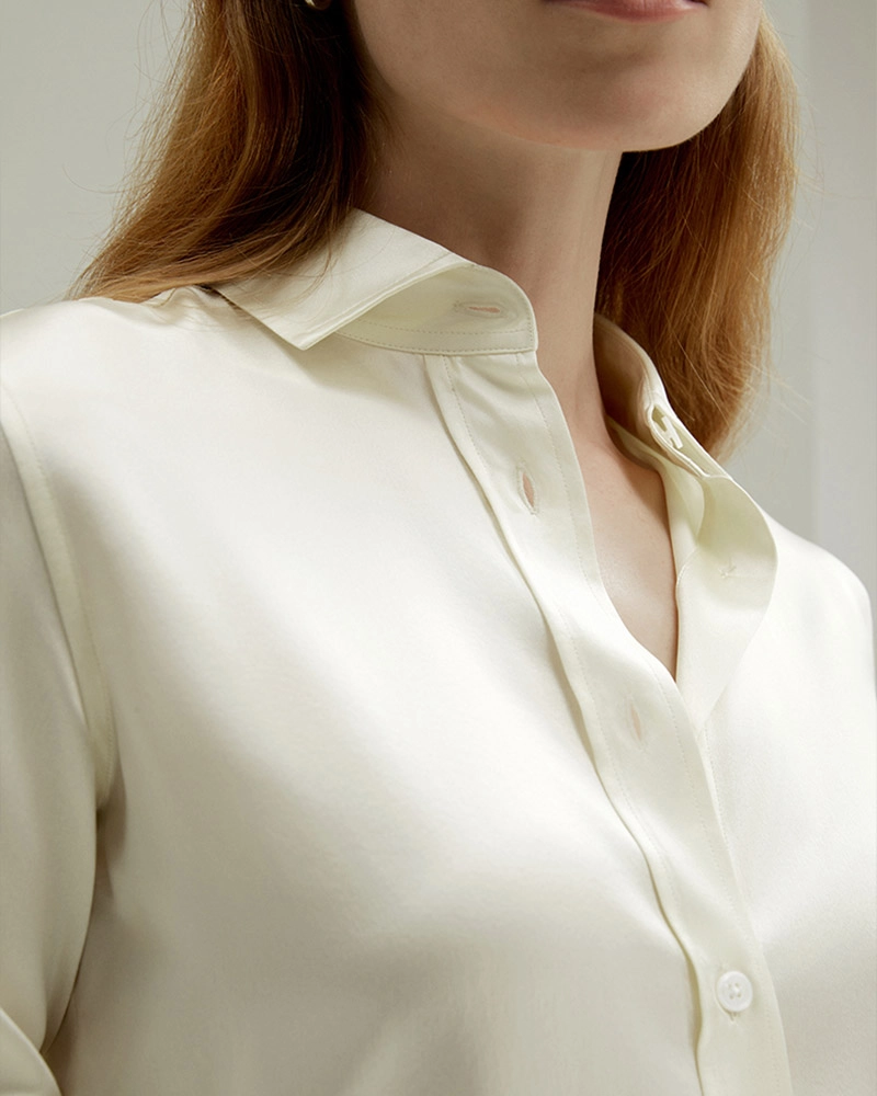 Silk blouse detail showing fine stitching