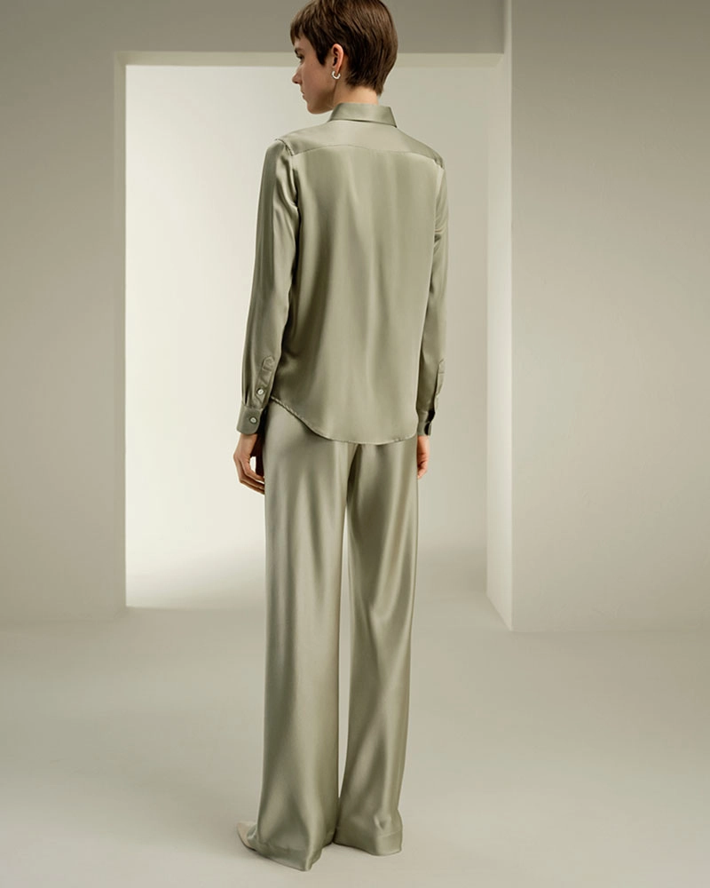 With 30+ years of experience, we are top women's shirt manufacturers, specializing in silk lapel shirts, fabric sourcing, and design.
