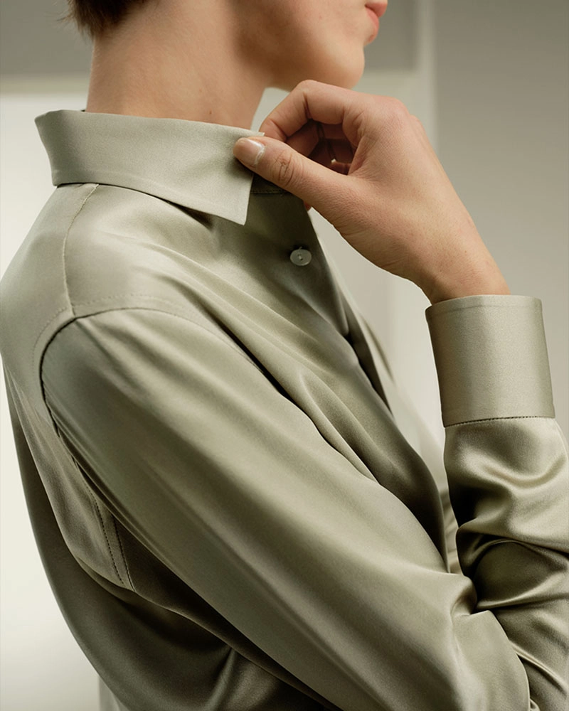Premium women's shirt manufacturers with 30+ years of expertise. We offer silk lapel shirts, fabric sourcing, and custom designs.