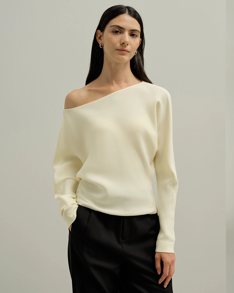 Elegant silk blouse in pastel color, perfect for Custom Made Clothing collection